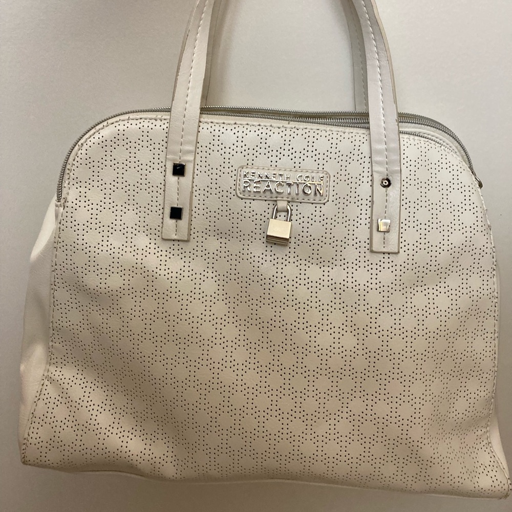 White hang bag. Used at least 3 times